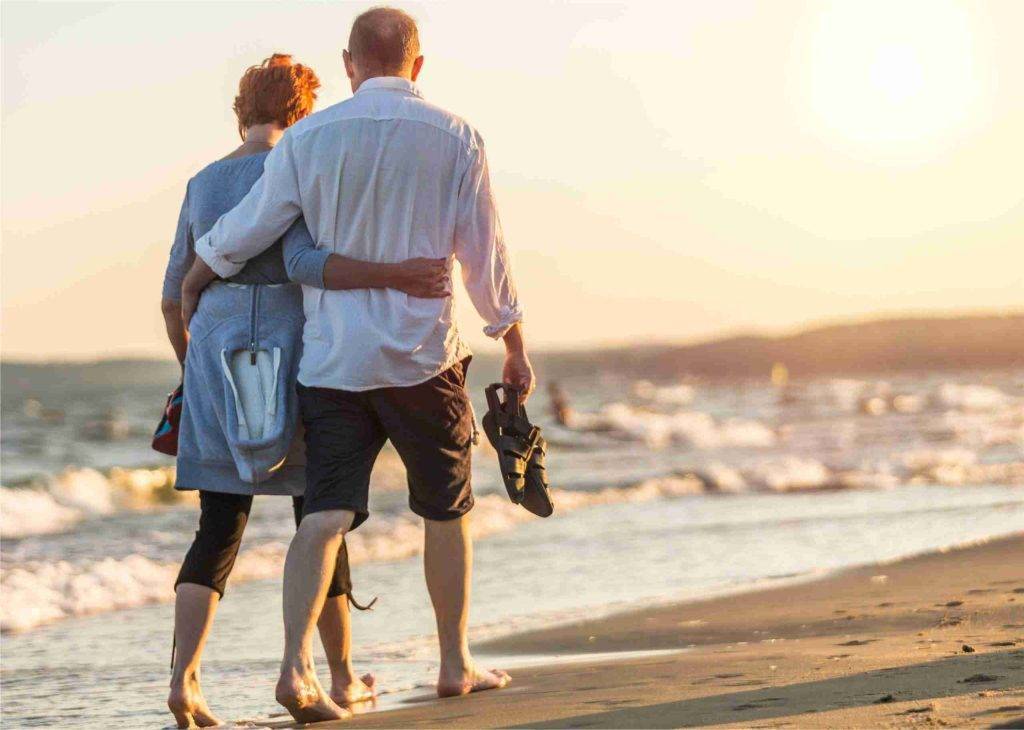 Goldstone Financial Retirement GPS - Portrait of a retired elderly couple hugging