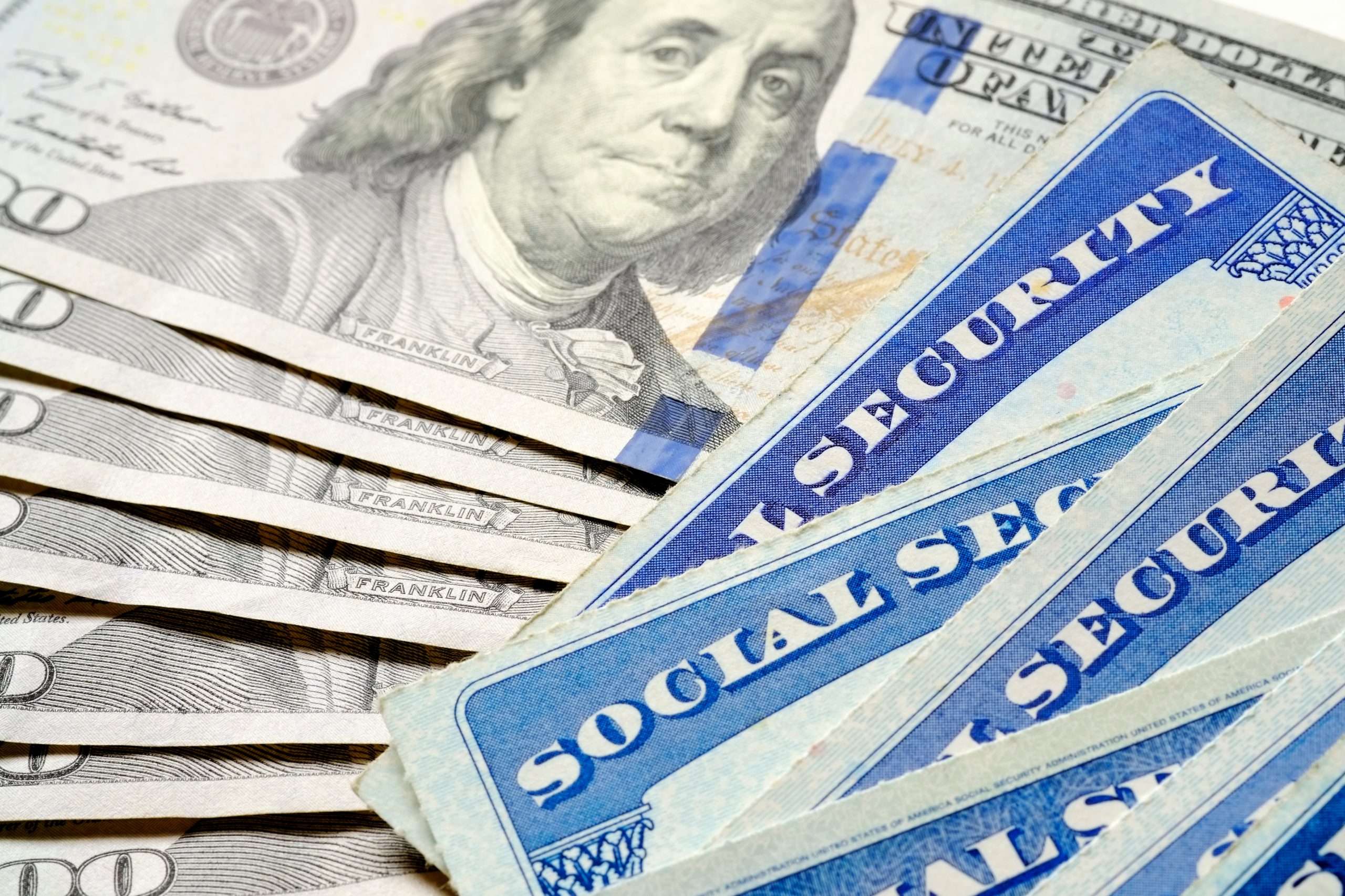 Social Security Benefits Estimator. Social Security Cards Representing Finances and Retirement