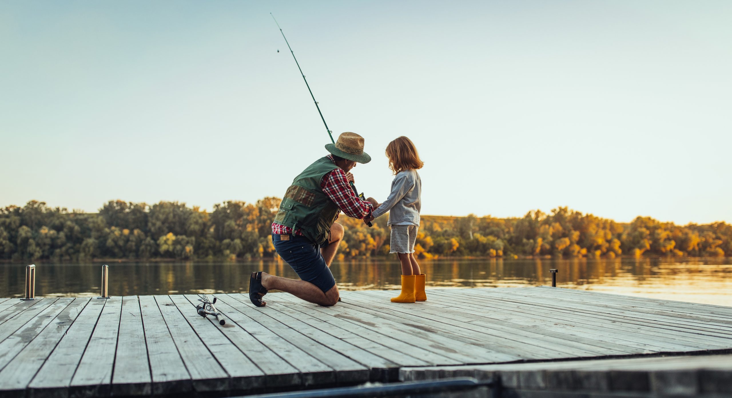 Grandfather and grandson granddaughter grandchild on a fishing adventure Today’s a good day for fishing